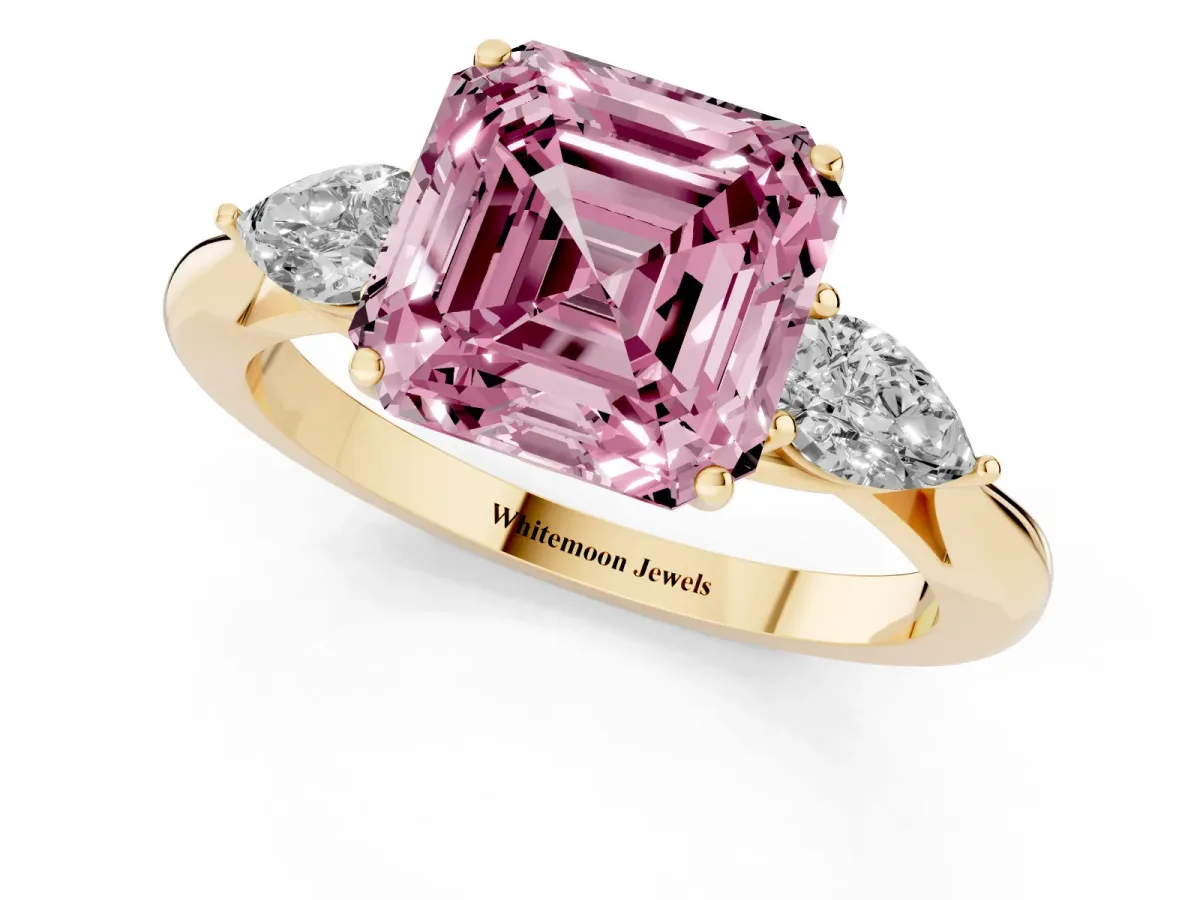 Fancy Pink Asscher Cut Diamond Three-Stone Ring with Pear Side Stones and Prong Setting Yellow gold