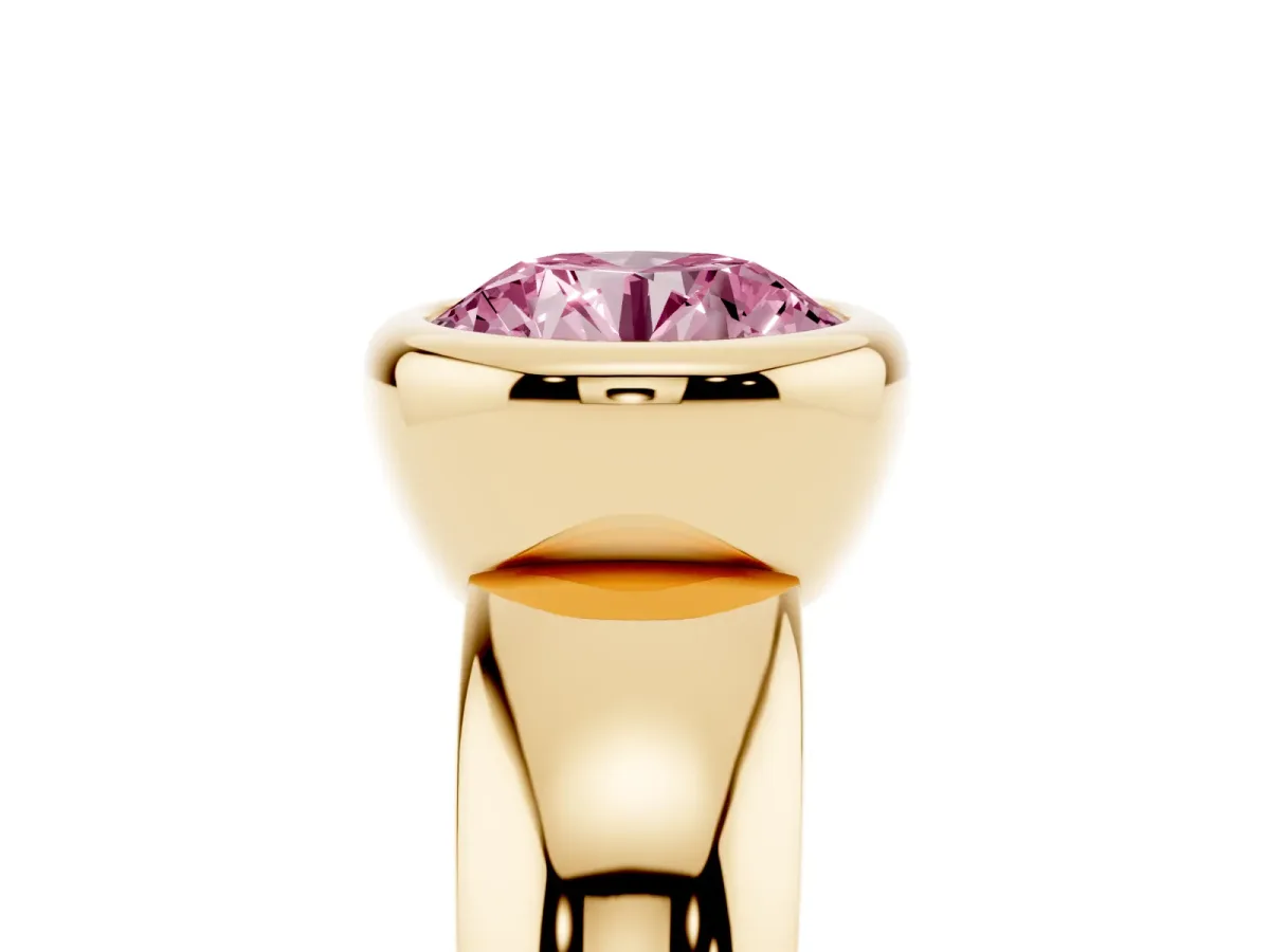 Fancy Pink Bezel Set Round Cut Solitaire Ring with Wide Band Yellow gold