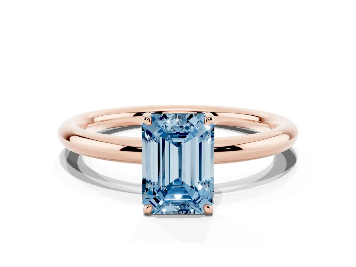 Fancy Blue Emerald Cut Solitaire Diamond Ring with Four-Prong Setting on a Plain Band Rose gold