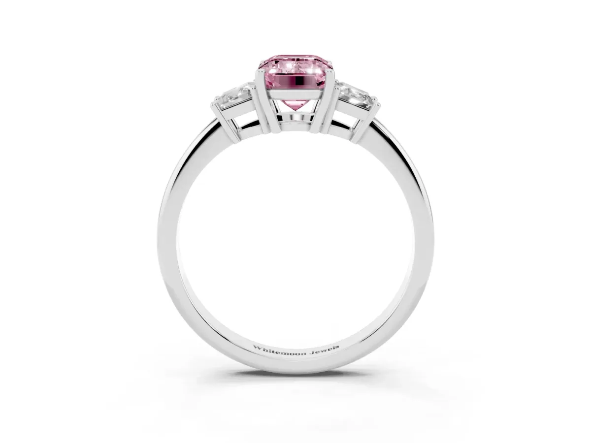 Fancy Pink Emerald Cut Diamond Three-Stone Ring with Trapezoid Side Stones and Prong Setting Platinum