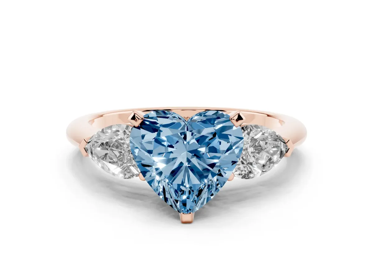 Fancy Blue Three-Stone Heart Cut Diamond Ring with Pear Side Stones and Four-Prong Setting Rose gold