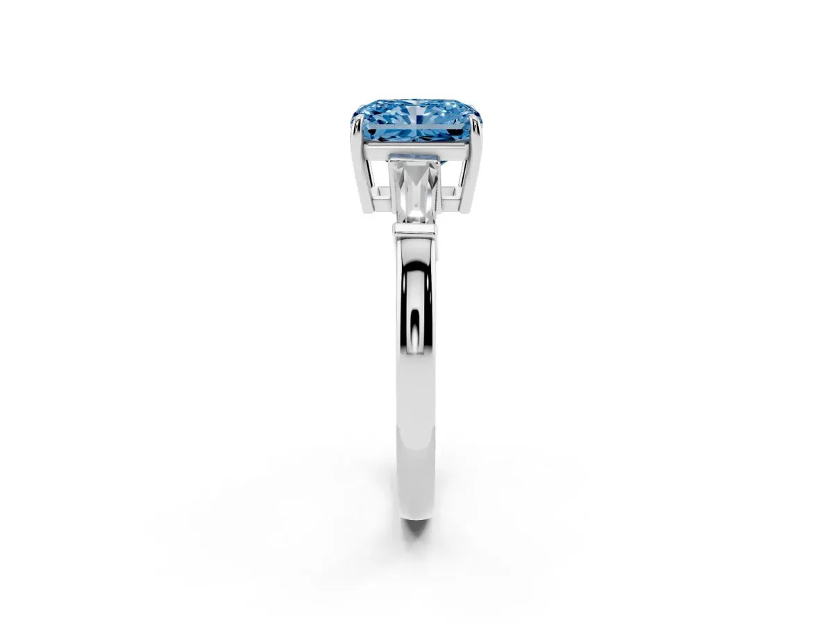 Fancy Blue Radiant Cut Diamond Three-Stone Ring with Tapered Baguette Side Stones and Prong Setting White gold