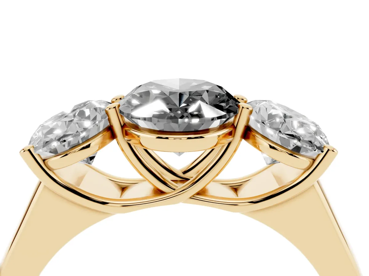 Fancy Black Oval Cut Three-Stone Diamond Ring with Prong Setting on a Classic Band Yellow gold