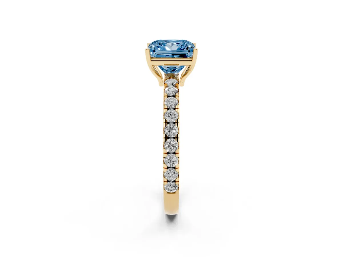 Fancy Blue Princess Cut Diamond Pavé Solitaire Engagement Ring with Four-Prong Setting Yellow gold