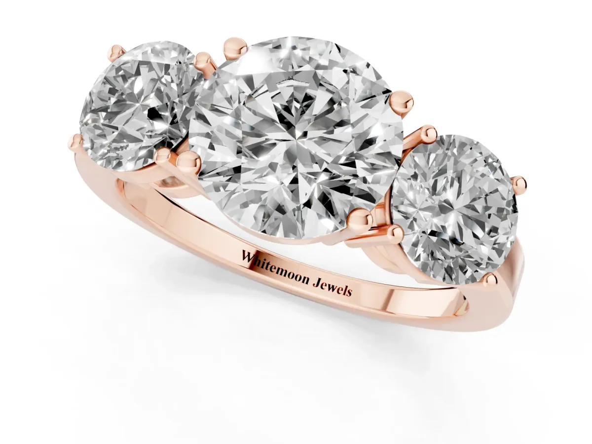 Three-Stone Round Cut Cut Diamond Engagement Ring with Flat Band and Four-Prong Setting Rose gold