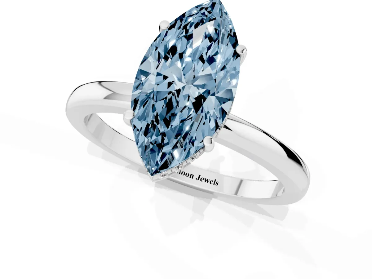 Fancy Blue Marquise Cut Solitaire Diamond Ring with Prong Setting and Plain Band Silver