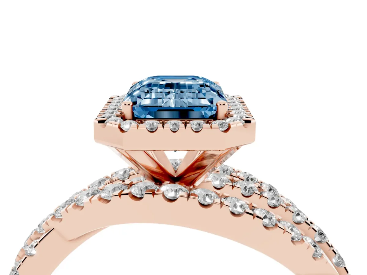 Fancy Blue Emerald Cut Diamond Halo Ring with Round Split Shank and Prong Setting Rose gold
