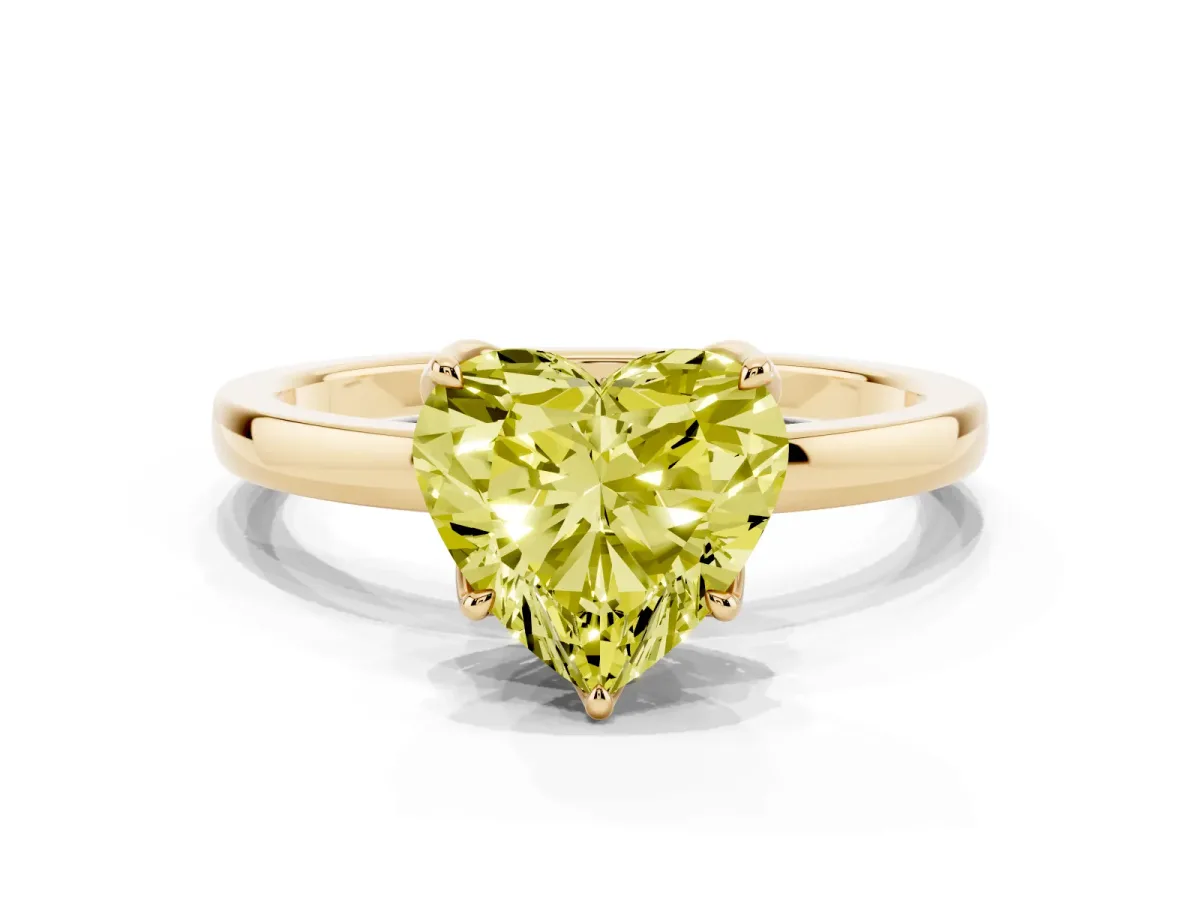 Fancy Yellow Heart Cut Diamond Solitaire Ring with Thin Band and Prong Setting Yellow gold
