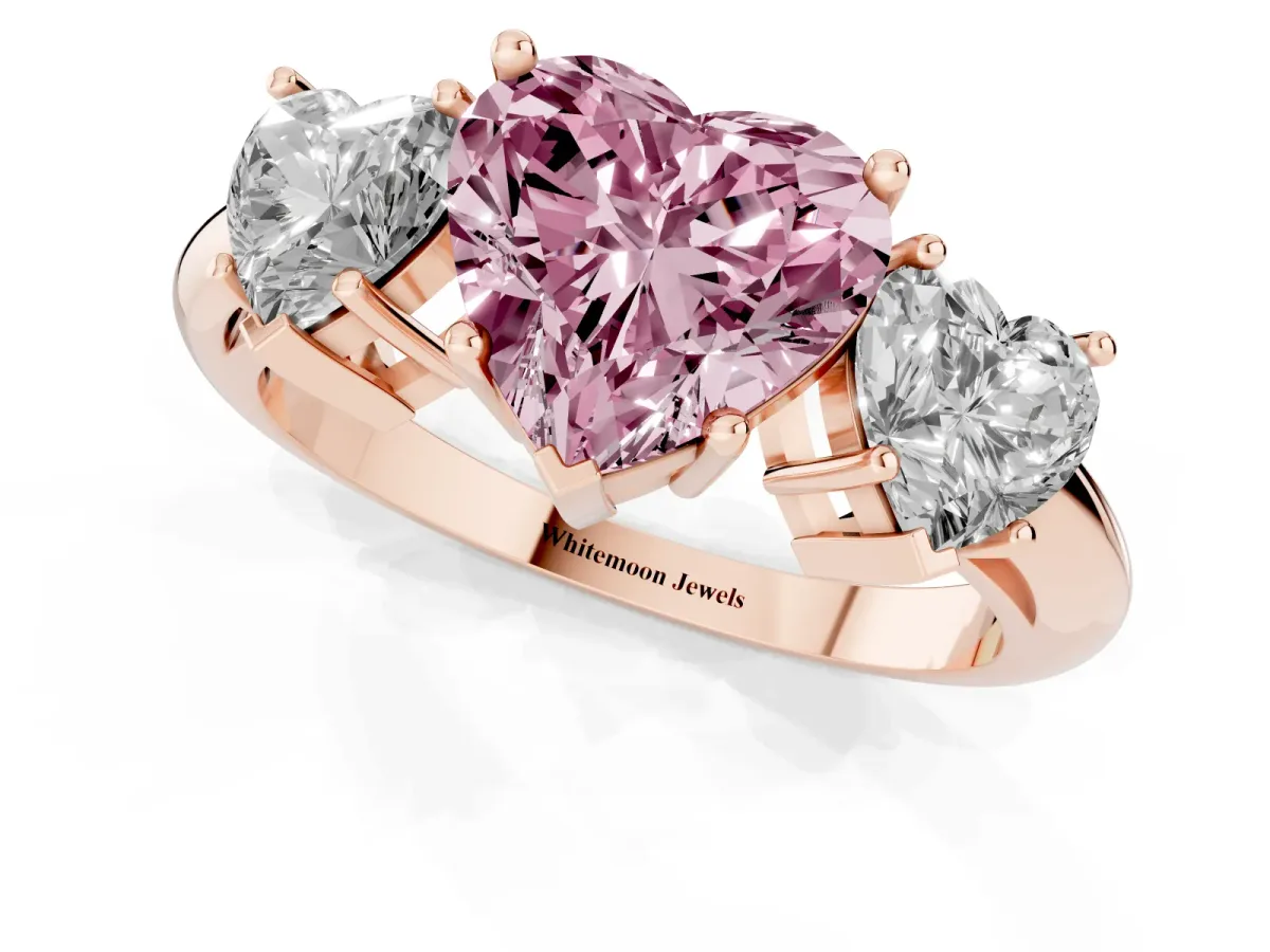 Fancy Pink Three-Stone Heart Cut Cut Diamond Engagement Ring with Prong Setting on a White Gold Band Rose gold