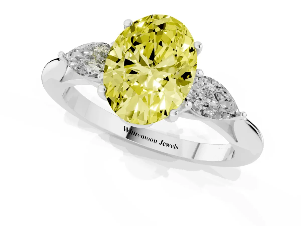 Fancy Yellow Oval Cut Diamond Three-Stone Ring with Pear Side Stones and Prong Setting Silver
