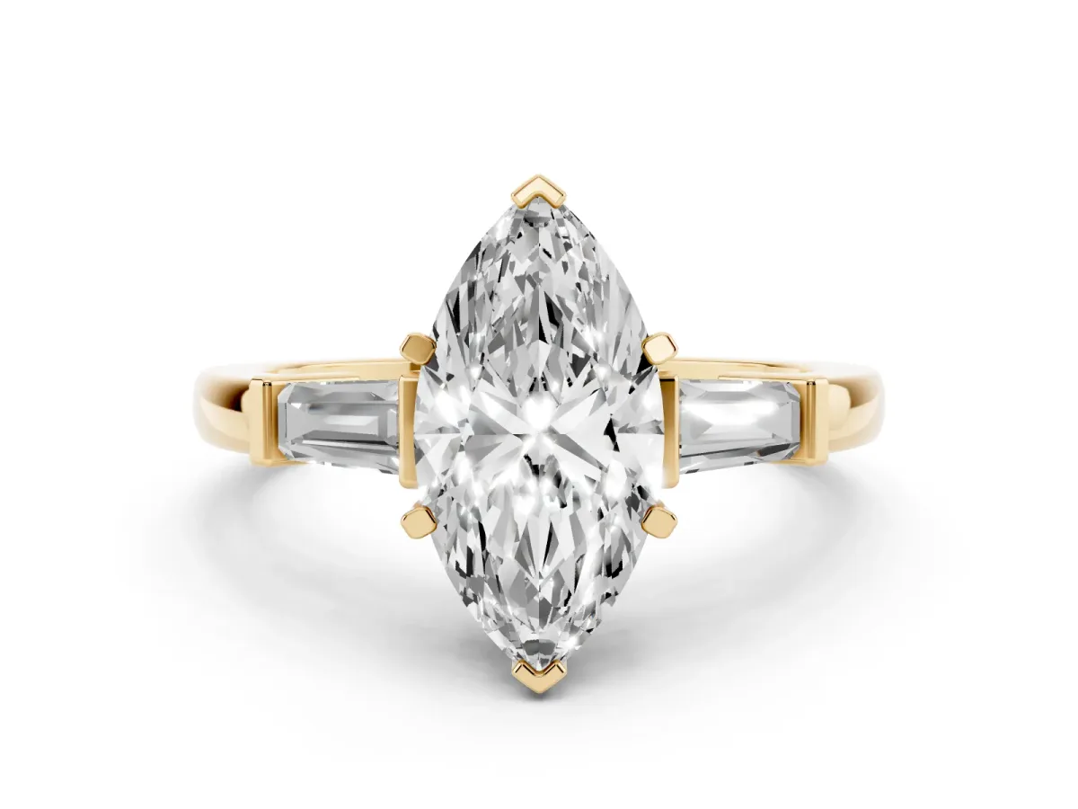 Marquise Cut Cut Diamond Solitaire Ring with Tapered Baguette Accents and Four-Prong Setting Yellow gold