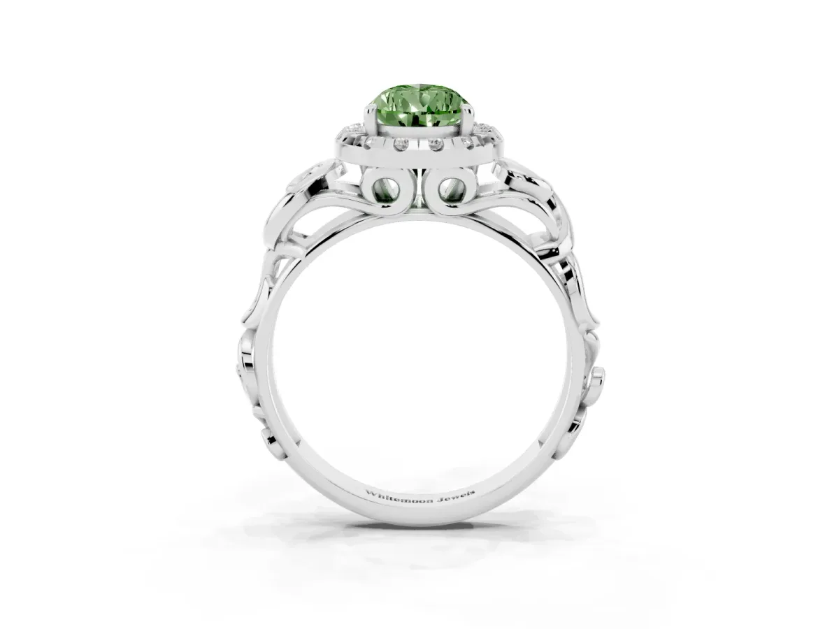 Fancy Green Pear Cut Cut Halo Diamond Ring with Scrollwork Band and Four-Prong Setting Platinum