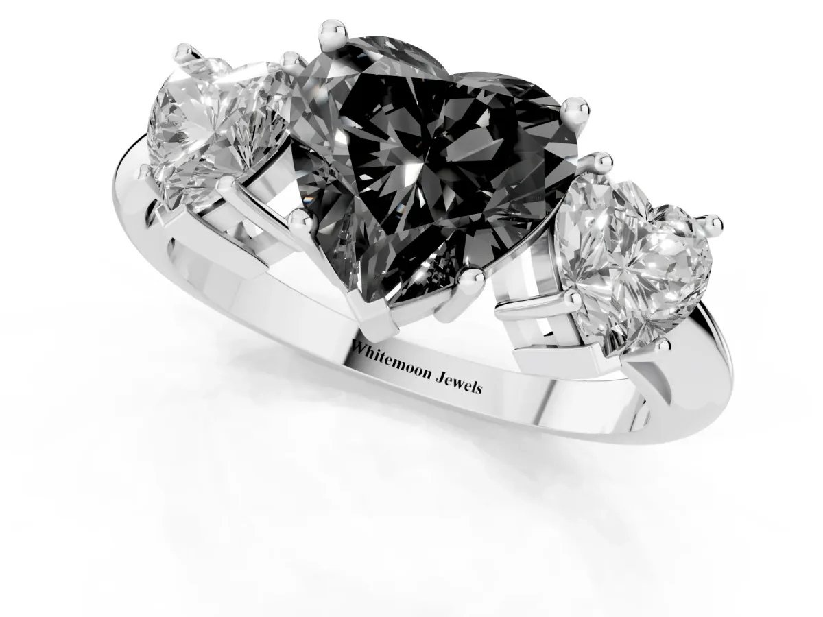 Fancy Black Three-Stone Heart Cut Cut Diamond Engagement Ring with Prong Setting on a White Gold Band Silver