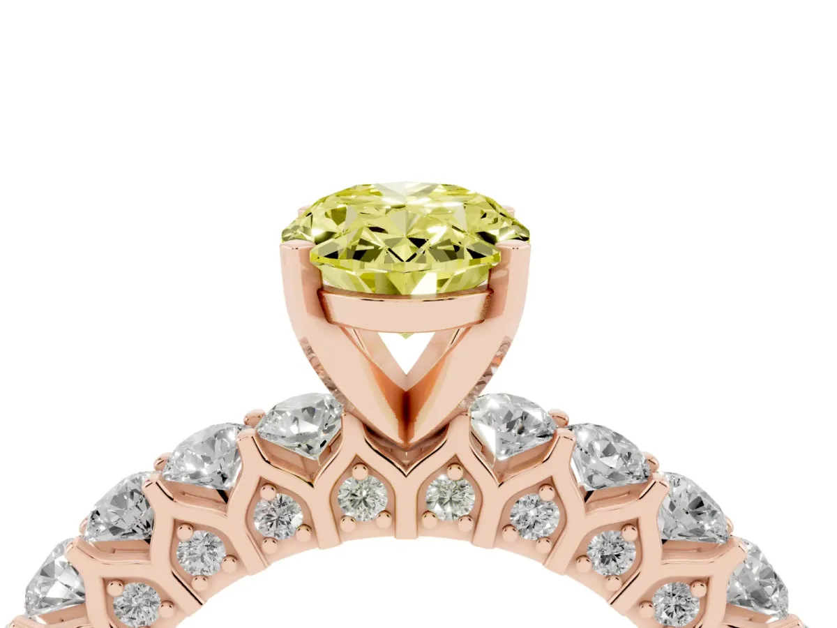 Fancy Yellow Oval Cut Diamond Solitaire Ring with Shared Prong Pavé Band and Four-Prong Setting Rose gold