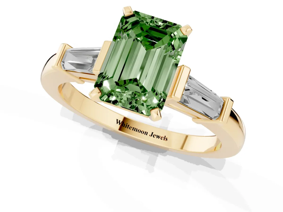 Fancy Green Emerald Cut Cut Diamond Solitaire Ring with Tapered Baguette Accents and Four-Prong Setting Yellow gold