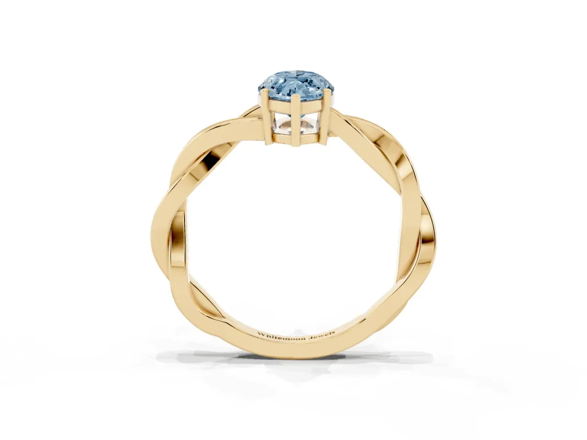 Fancy Blue Marquise Cut Solitaire Twisted Pave Diamond Ring with Four-Prong Setting Yellow gold