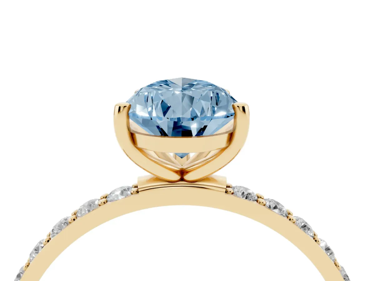 Fancy Blue Pear Cut Diamond Solitaire Ring with Round Pavé Shoulders and Prong Setting Yellow gold
