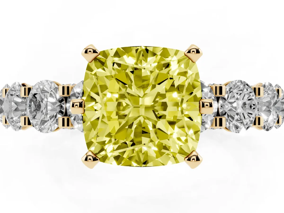 Fancy Yellow Cushion Cut Diamond Side Stone Engagement Ring with Four-Prong Setting Yellow gold