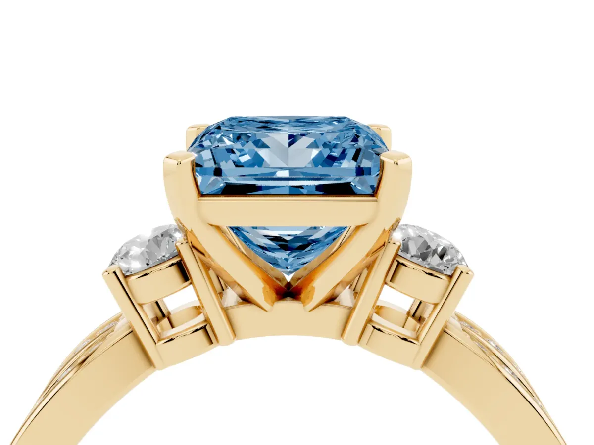 Fancy Blue Three-Stone Princess Cut Cut Diamond Twist Band with Prong Setting Yellow gold