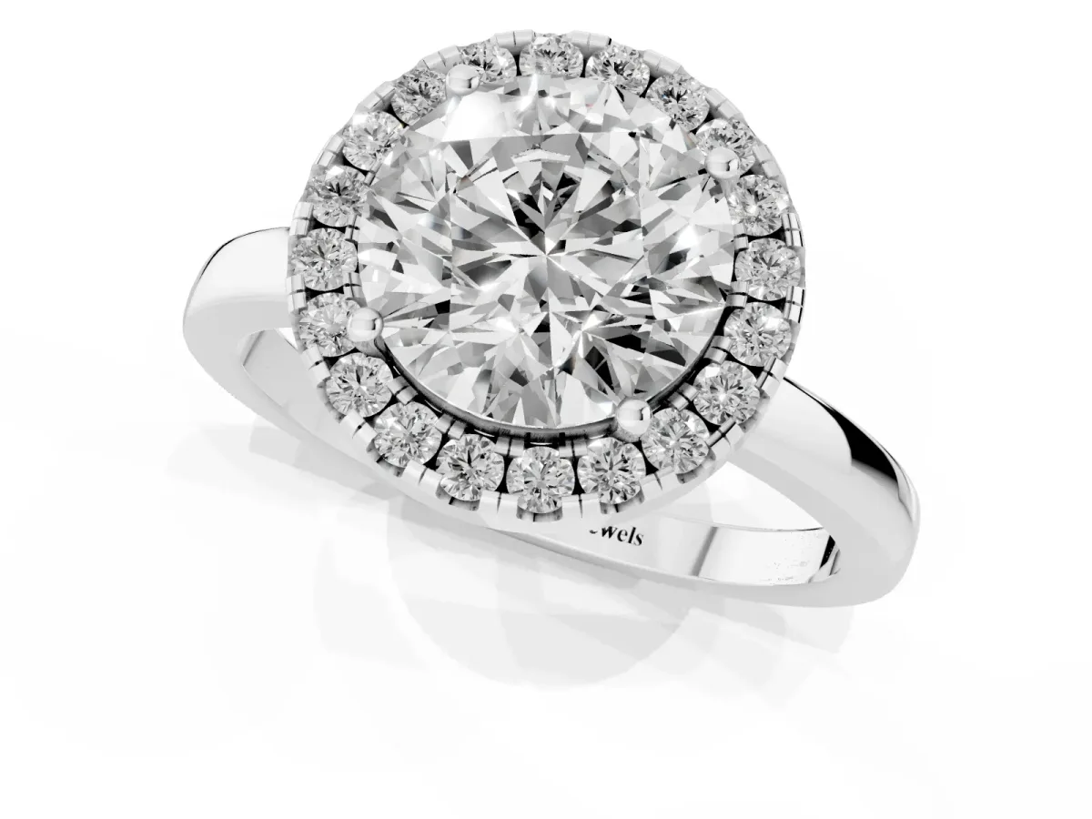 Round Cut Halo Diamond Solitaire with Pavé Band and Four-Prong Setting Silver