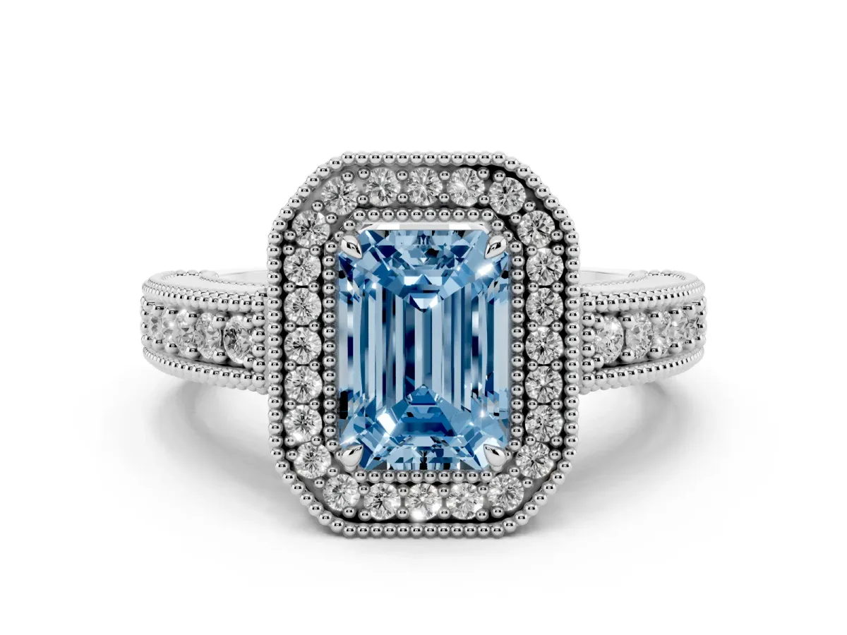 Fancy Blue Emerald Cut Cut Halo Diamond Ring with Pavé Band and Four-Prong Setting White gold