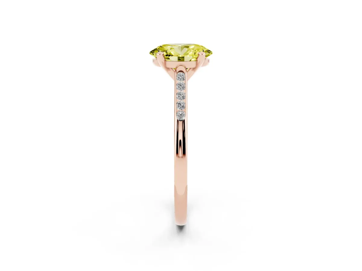 Fancy Yellow Oval Cut Diamond Solitaire Ring with Channel Set Round Band and Prong Setting Rose gold