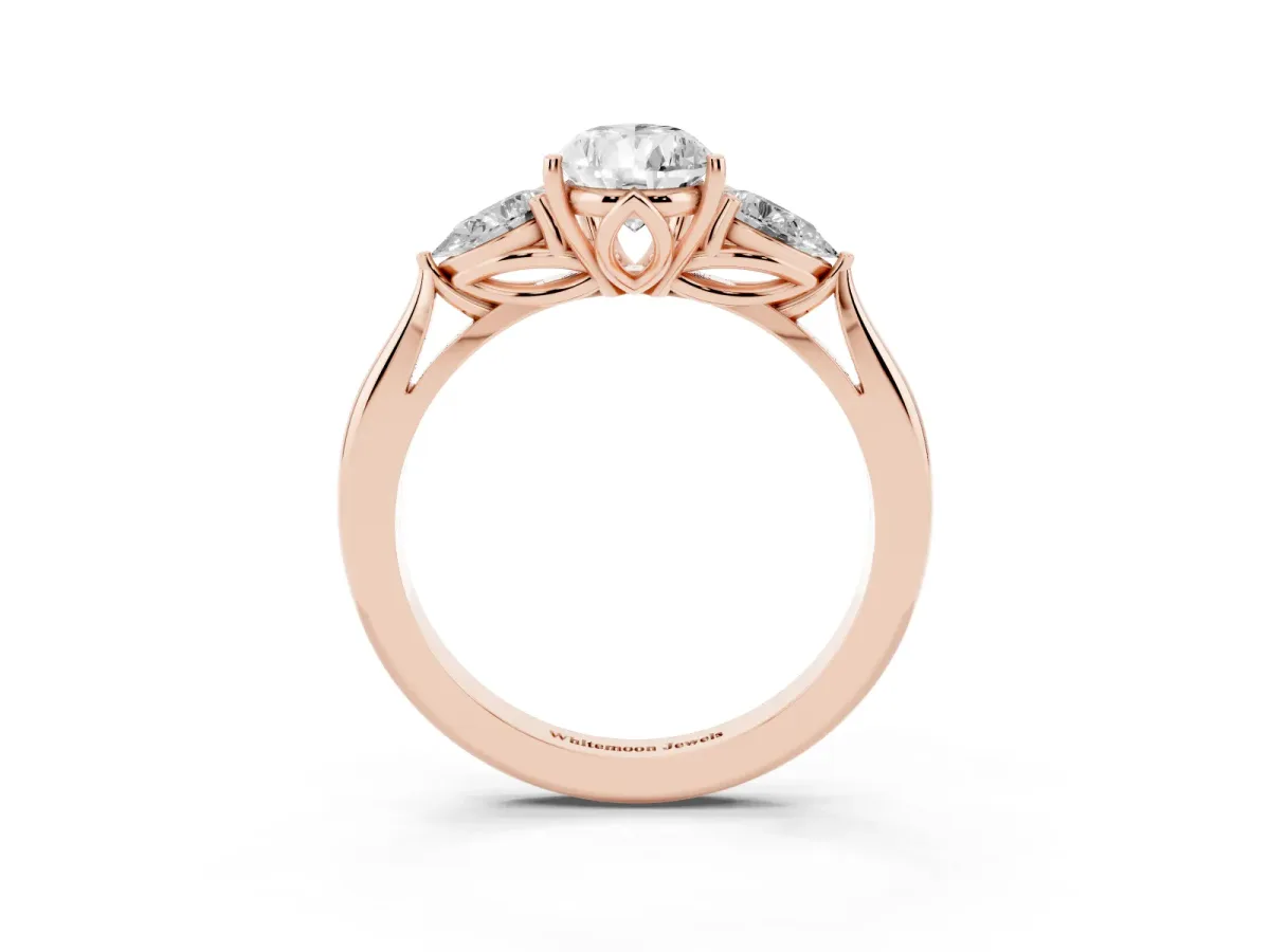 Pear Cut Diamond Three-Stone Ring with Pear Side Stones and Prong Setting Rose gold