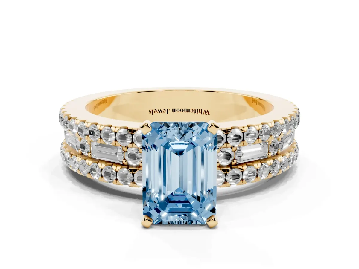 Fancy Blue Emerald Cut Diamond Solitaire Ring with Pavé and Channel Set Band Yellow gold