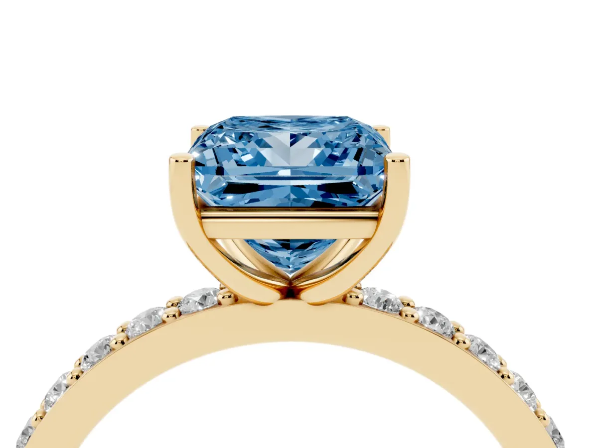 Fancy Blue Princess Cut Cut Diamond Solitaire with Pave Band and Four-Prong Setting Yellow gold