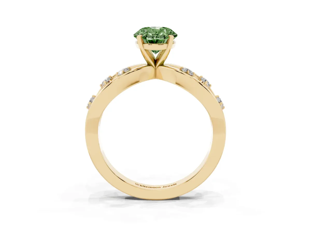 Fancy Green Oval Cut Cut Solitaire Diamond with Side Stones on Criss-Cross Band and Four-Prong Setting Yellow gold