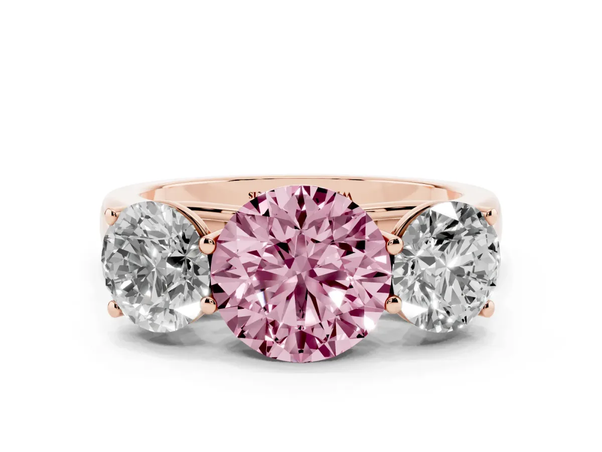 Fancy Pink Round Cut Three-Stone Diamond Ring with Prong Setting on a Classic Band Rose gold