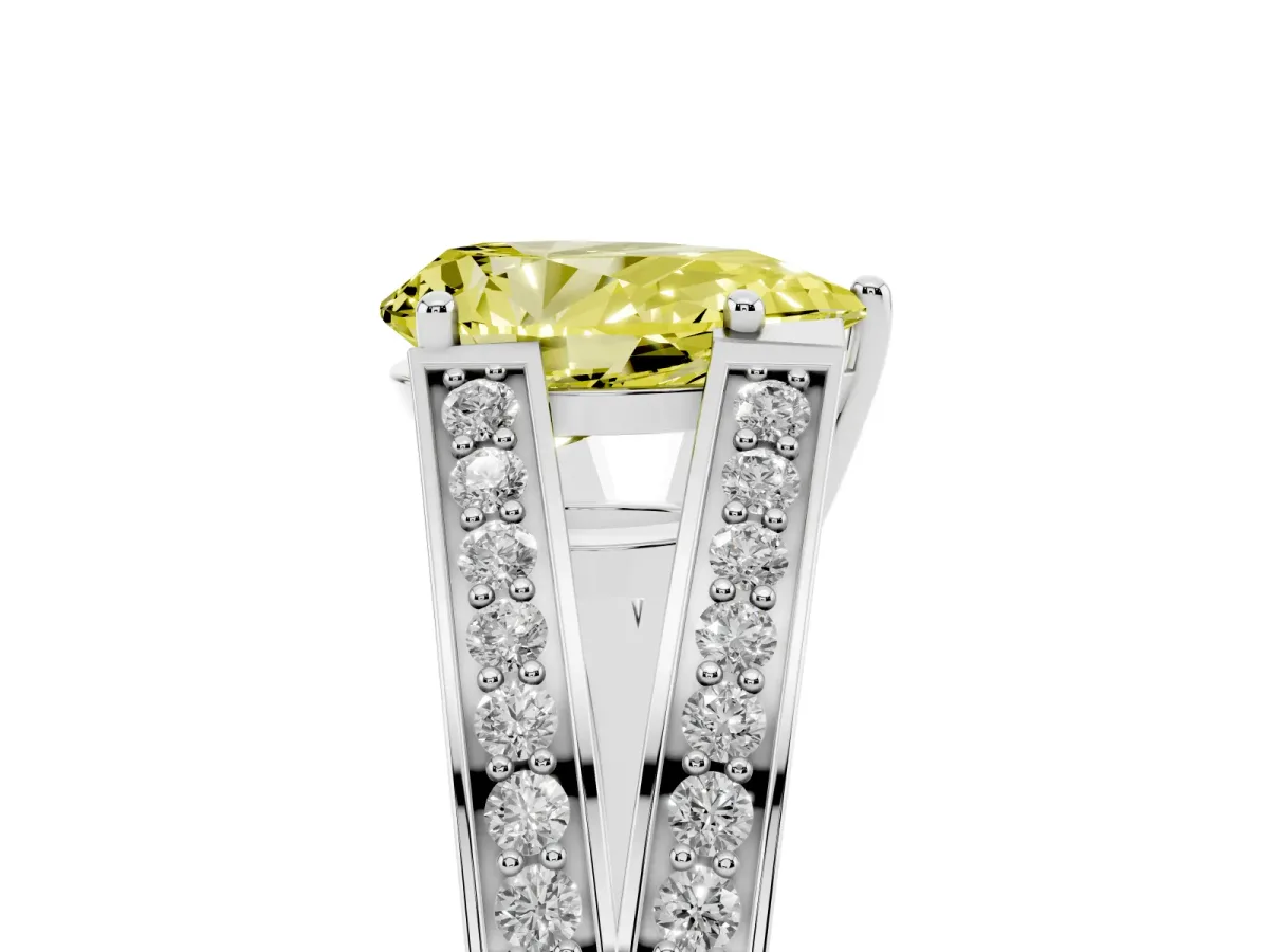 Fancy Yellow Pear Cut Diamond Split Shank Ring with Pavé Band and Four-Prong Setting Silver