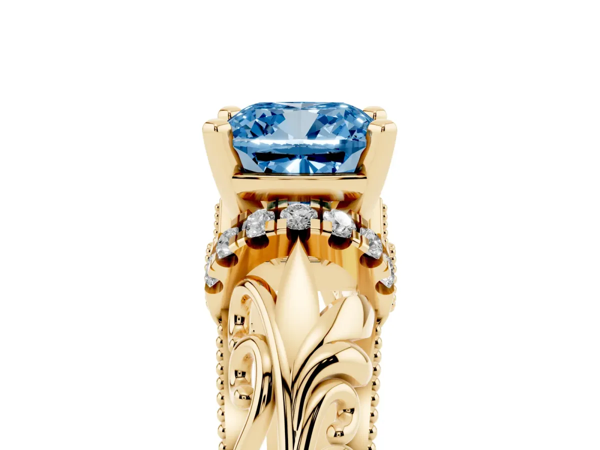 Fancy Blue Cushion Cut Solitaire Filigree Engagement Ring with Halo and Prong Setting Yellow gold