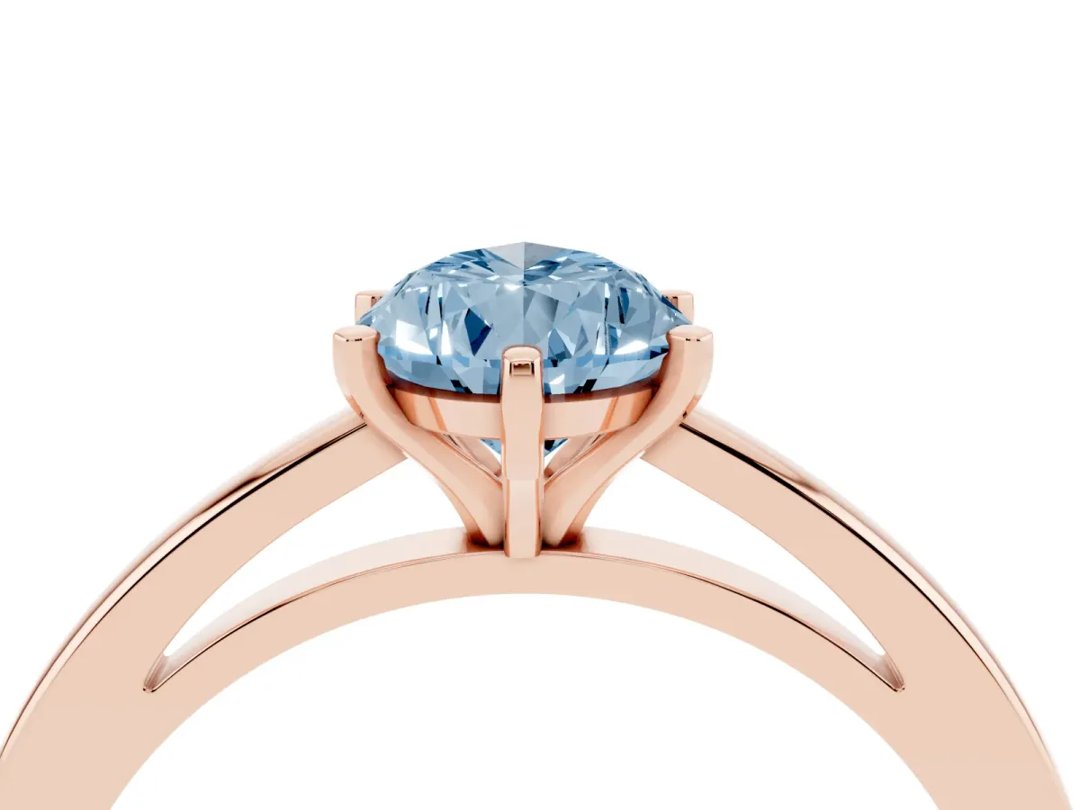 Fancy Blue Pear Cut Solitaire Diamond Engagement Ring with Four-Prong Setting on a Classic Band Rose gold