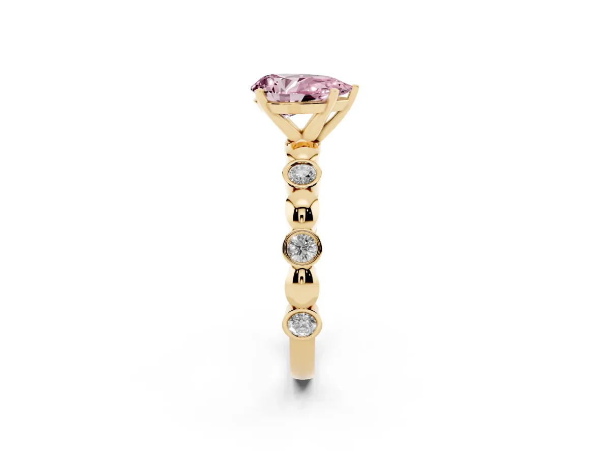 Fancy Pink Pear Cut Solitaire Bezel-Set Diamond Ring with Beaded Band and Four-Prong Setting Yellow gold