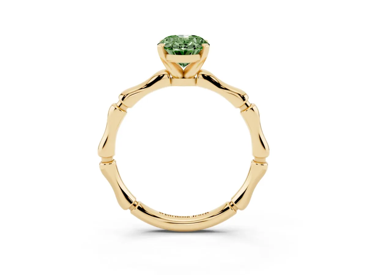 Fancy Green Oval Cut Solitaire Diamond Ring with Bamboo Band and Four-Prong Setting Yellow gold
