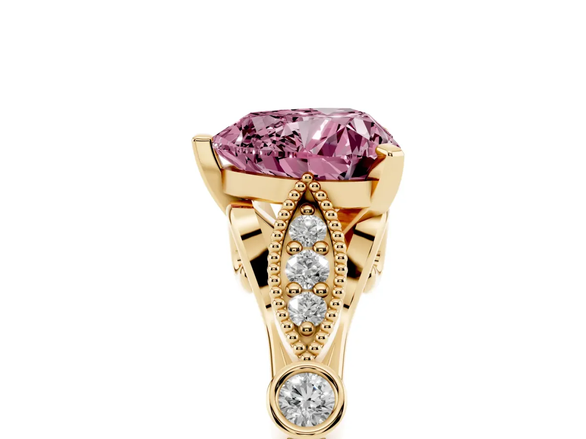 Fancy Pink Heart Cut Cut Diamond with Milgrain Marquise and Bezel Accents on a Solitaire Band with Prong Setting Yellow gold