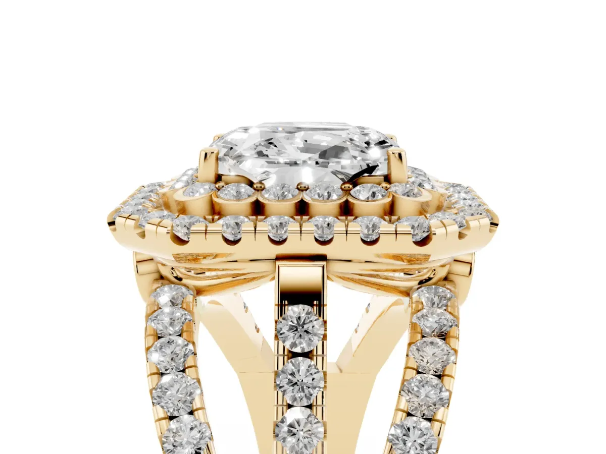 Emerald Cut Diamond Double Halo Ring with Round Pavé Split Shank and Prong Setting Yellow gold