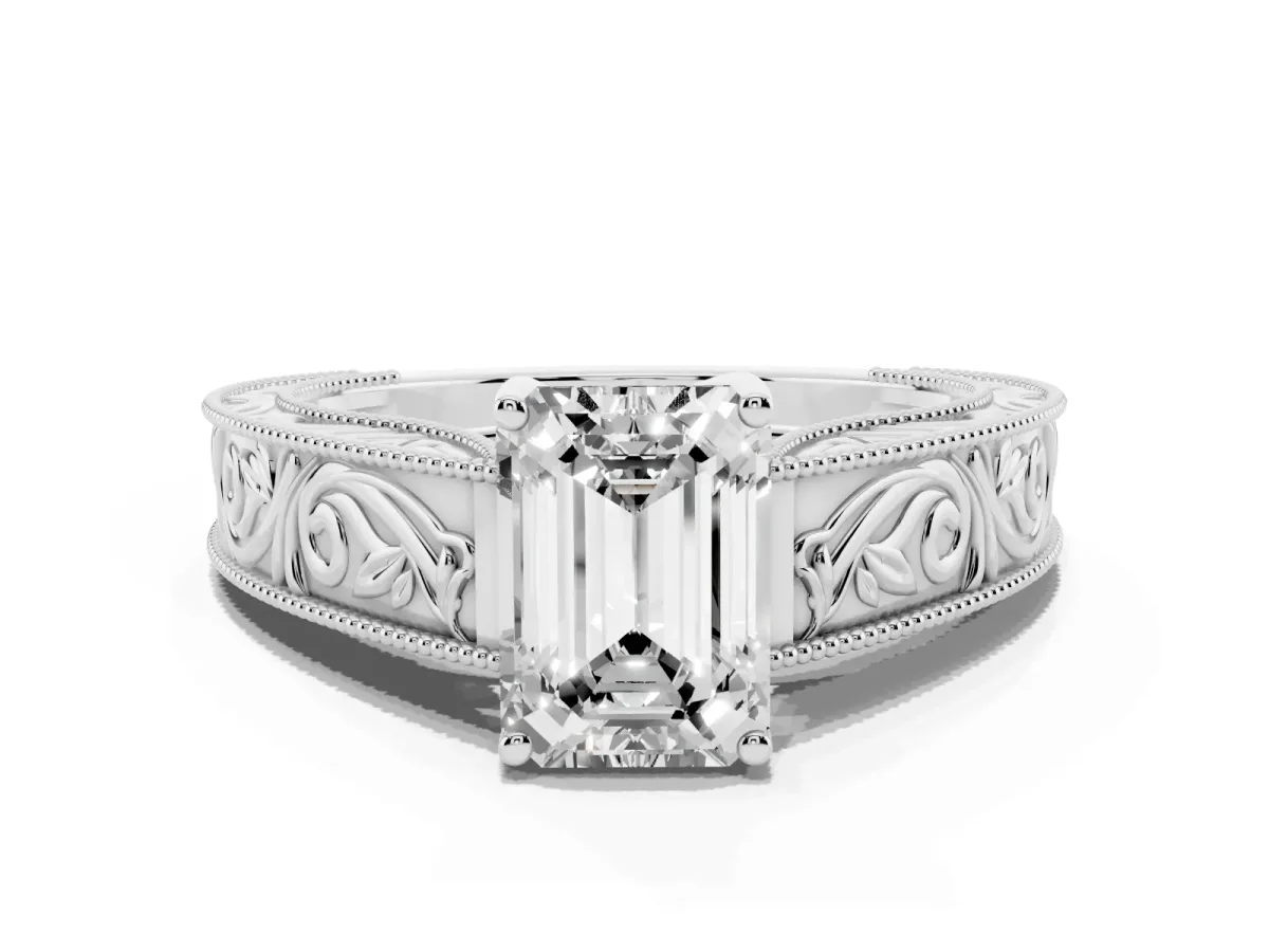 Emerald Cut Diamond Solitaire Ring with Engraved Band and Four-Prong Setting Platinum