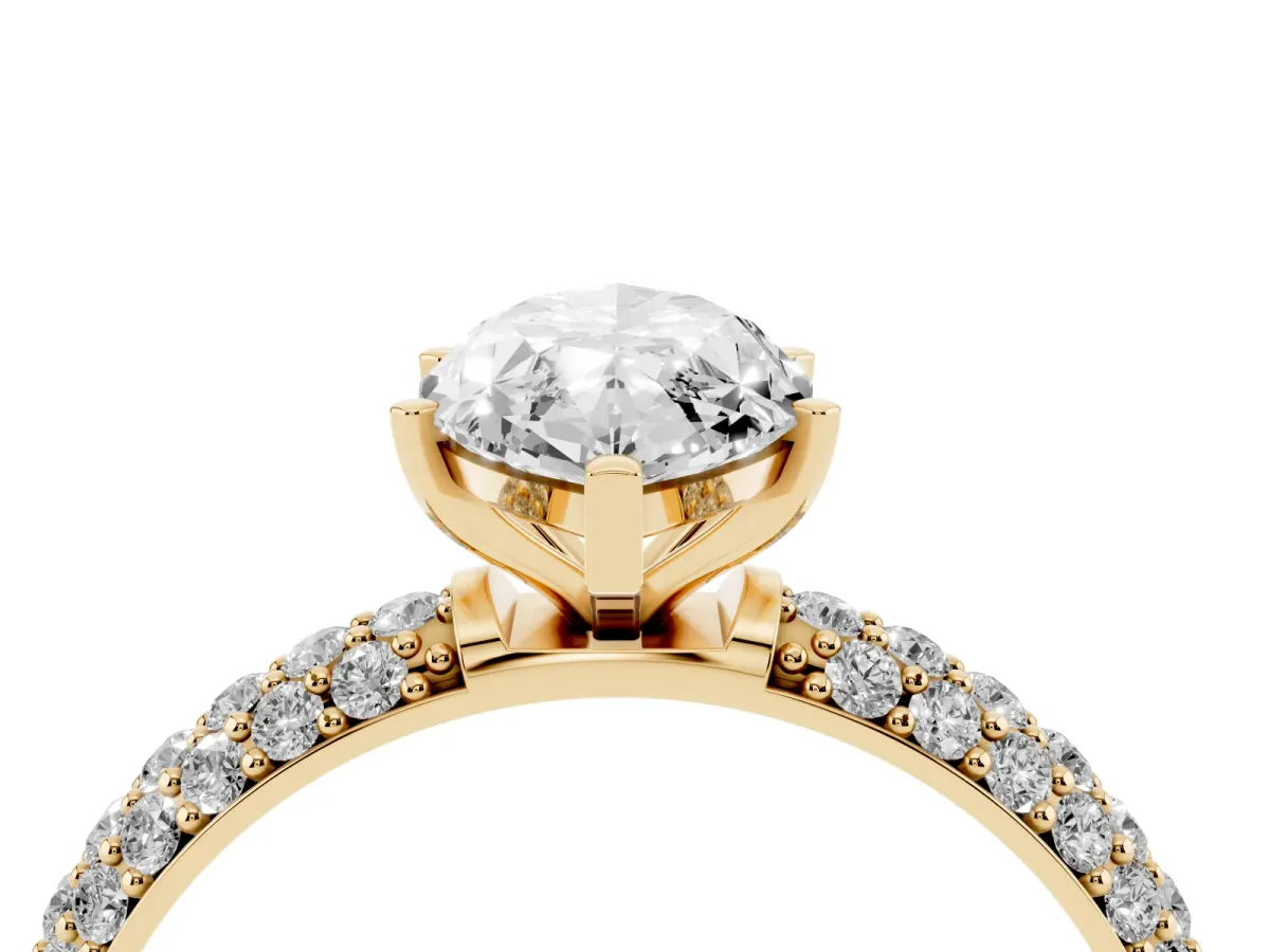 Marquise Cut Diamond Solitaire Ring with Prong Setting and Pavé Band Yellow gold