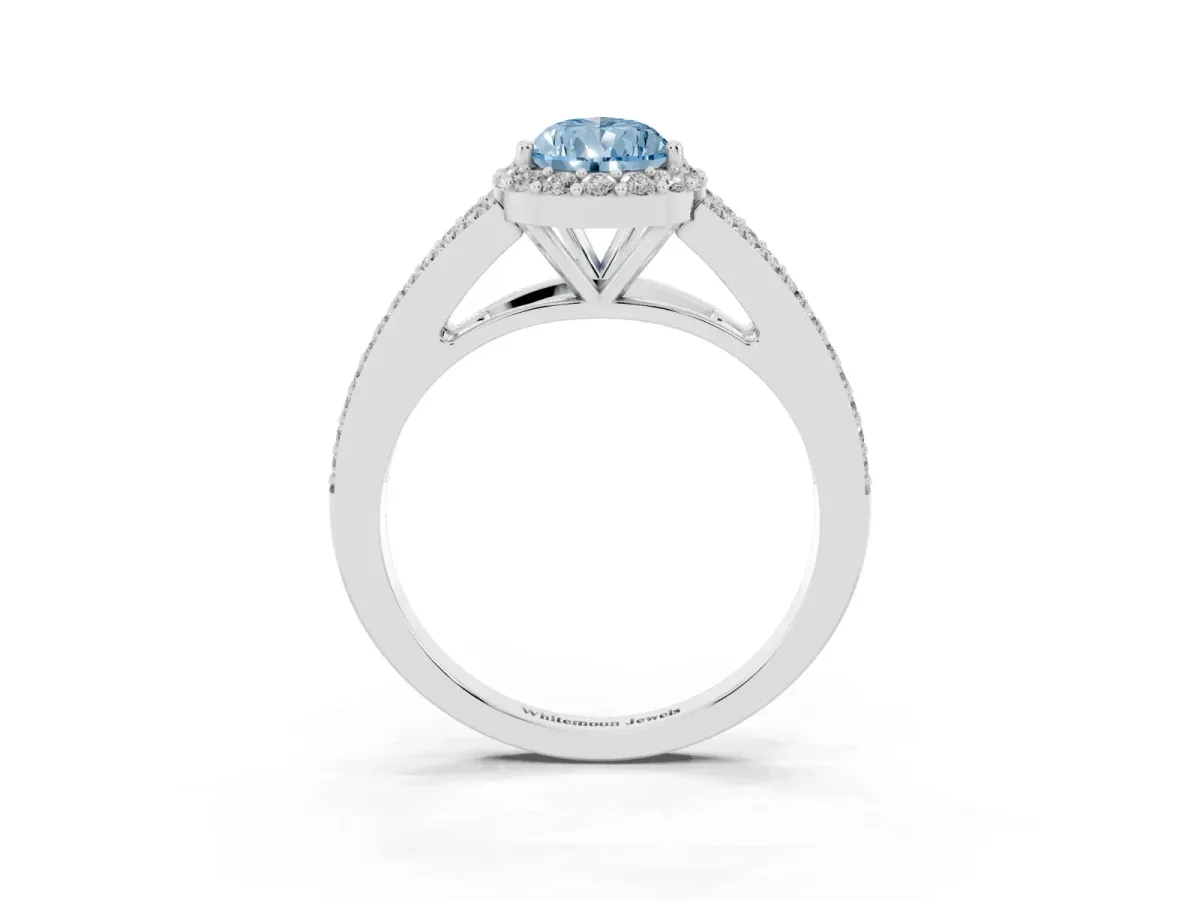Fancy Blue Pear Cut Halo Split Shank Diamond Ring with Prong Setting Platinum