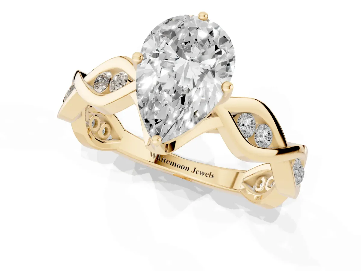 Pear Cut Solitaire Twist Band with Leaf Prong Setting Yellow gold