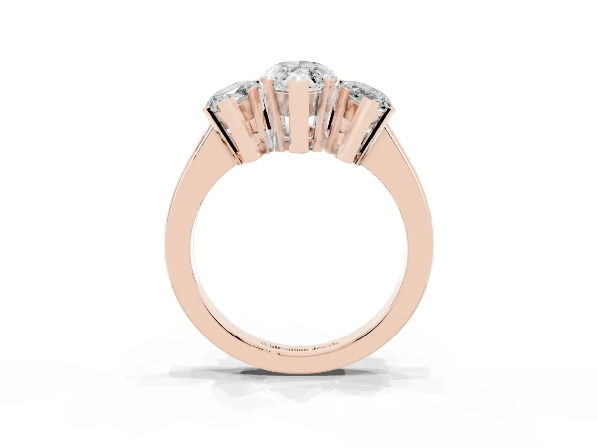 Three-Stone Marquise Cut Cut Diamond Ring with Channel Set Band and Four-Prong Setting Rose gold