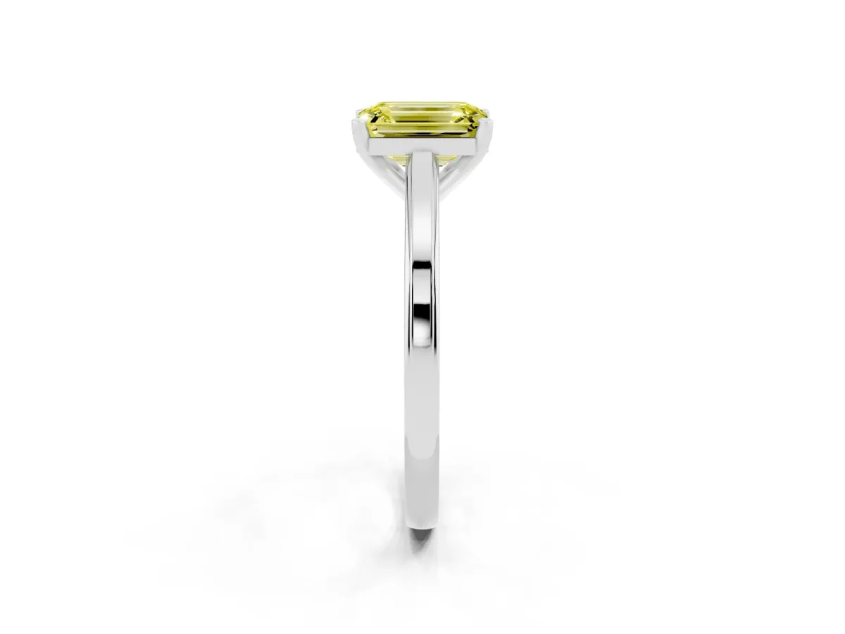 Fancy Yellow Emerald Cut Solitaire Diamond Ring with Four-Prong Setting and Classic Band Silver