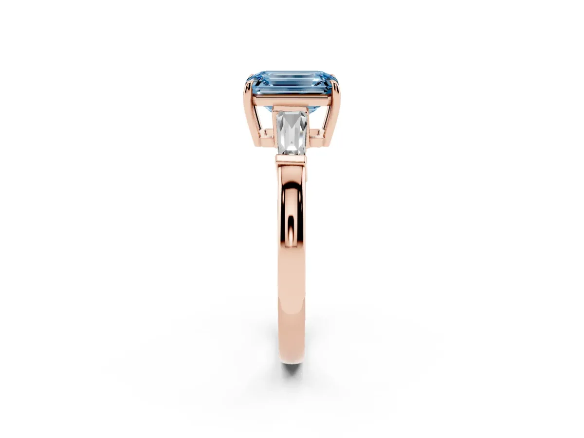 Fancy Blue Emerald Cut Diamond Three-Stone Ring with Tapered Baguette Side Stones and Prong Setting Rose gold