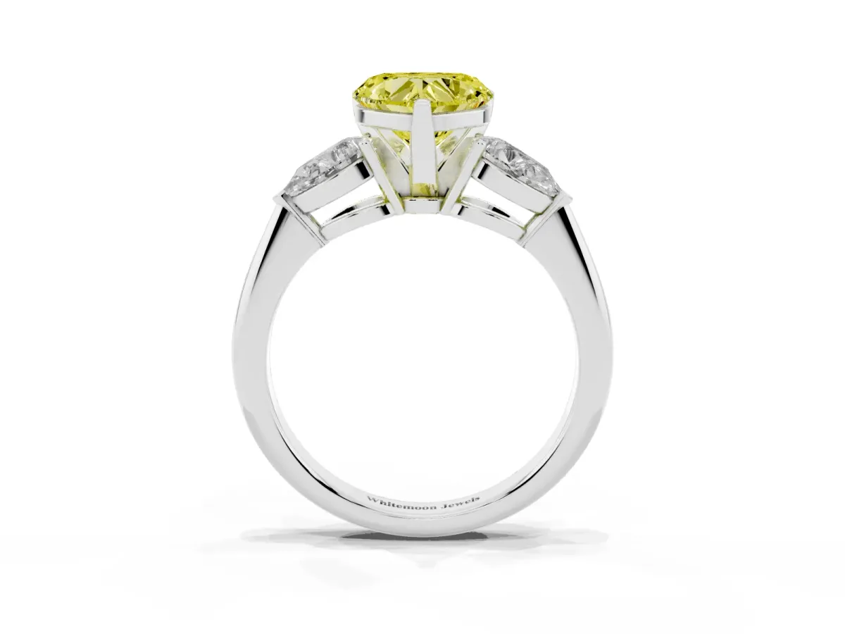 Fancy Yellow Three-Stone Heart Cut Diamond Ring with Pear Side Stones and Four-Prong Setting Silver