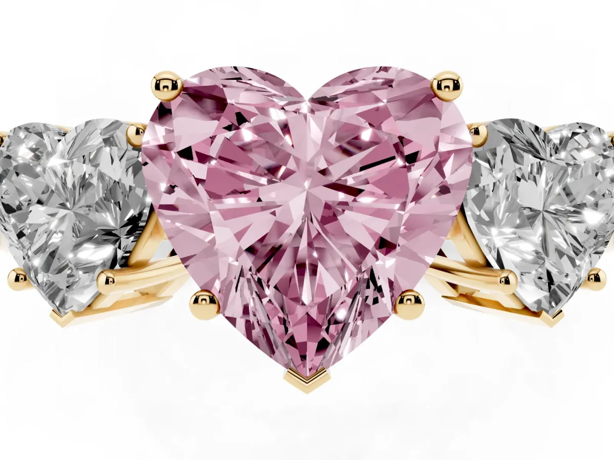 Fancy Pink Three-Stone Heart Cut Cut Diamond Engagement Ring with Flat Band and Four-Prong Setting Yellow gold