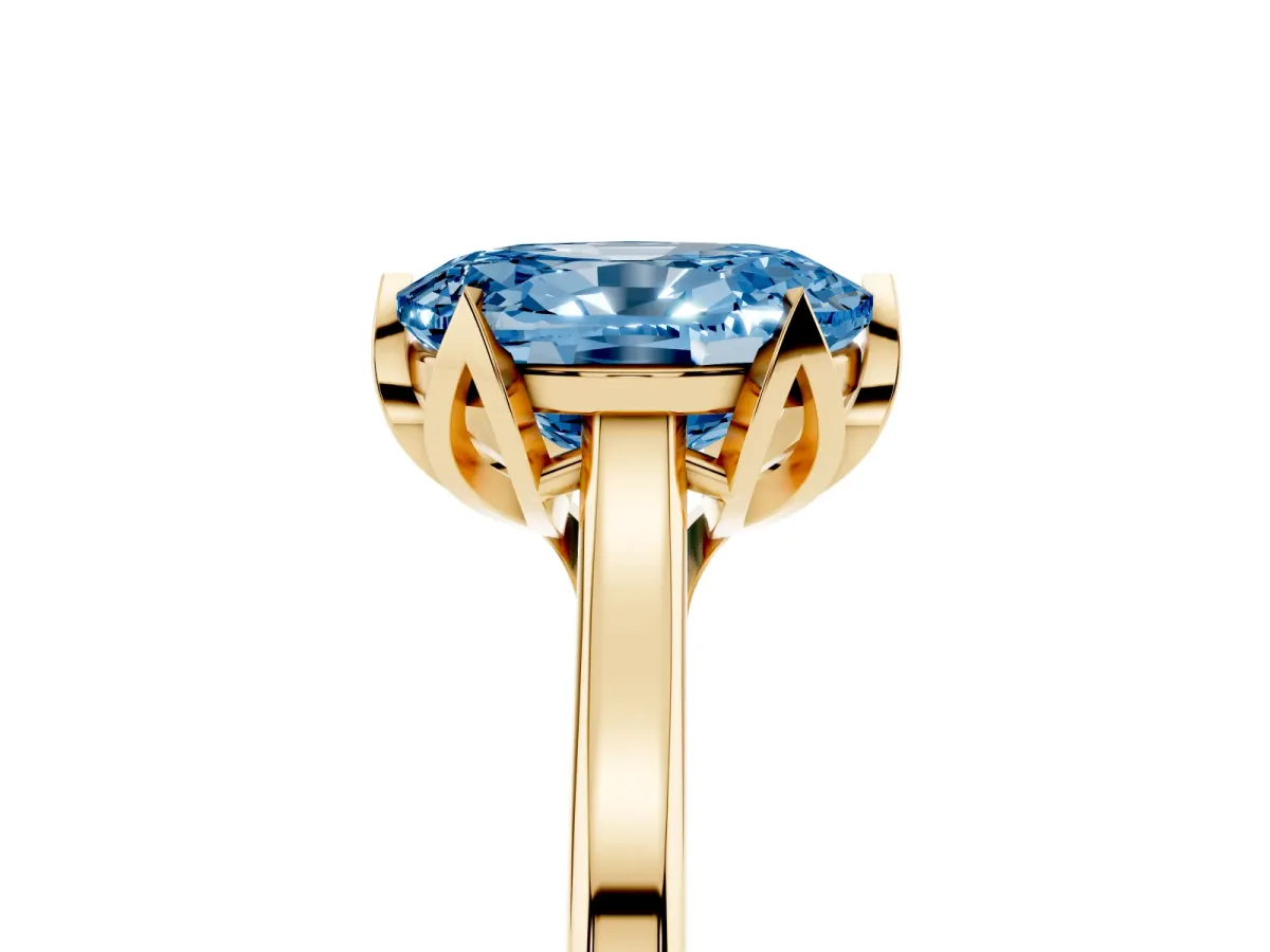 Fancy Blue Oval Cut Diamond Solitaire Ring with Flower Prong Setting and Classic Band Yellow gold