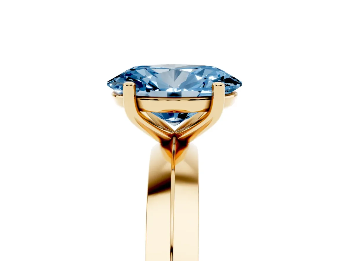 Fancy Blue Oval Cut Cut Solitaire Engagement Ring with Flat Band and Four-Prong Setting Yellow gold