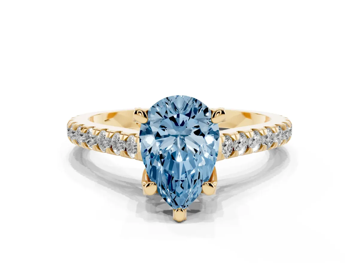 Fancy Blue Pear Cut Brilliant Diamond Solitaire with Pavé Band and Four-Prong Setting Yellow gold